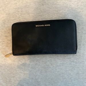 Michael Kors long black zipper wallet with gold